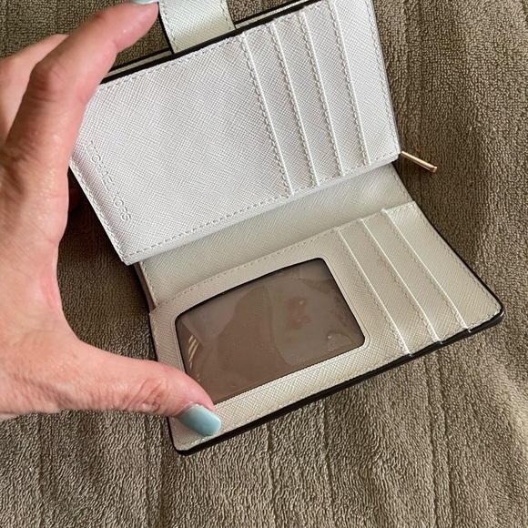 Michael Kors purse, White purse with pink rose accents with matching wallet. - Picture 6 of 7